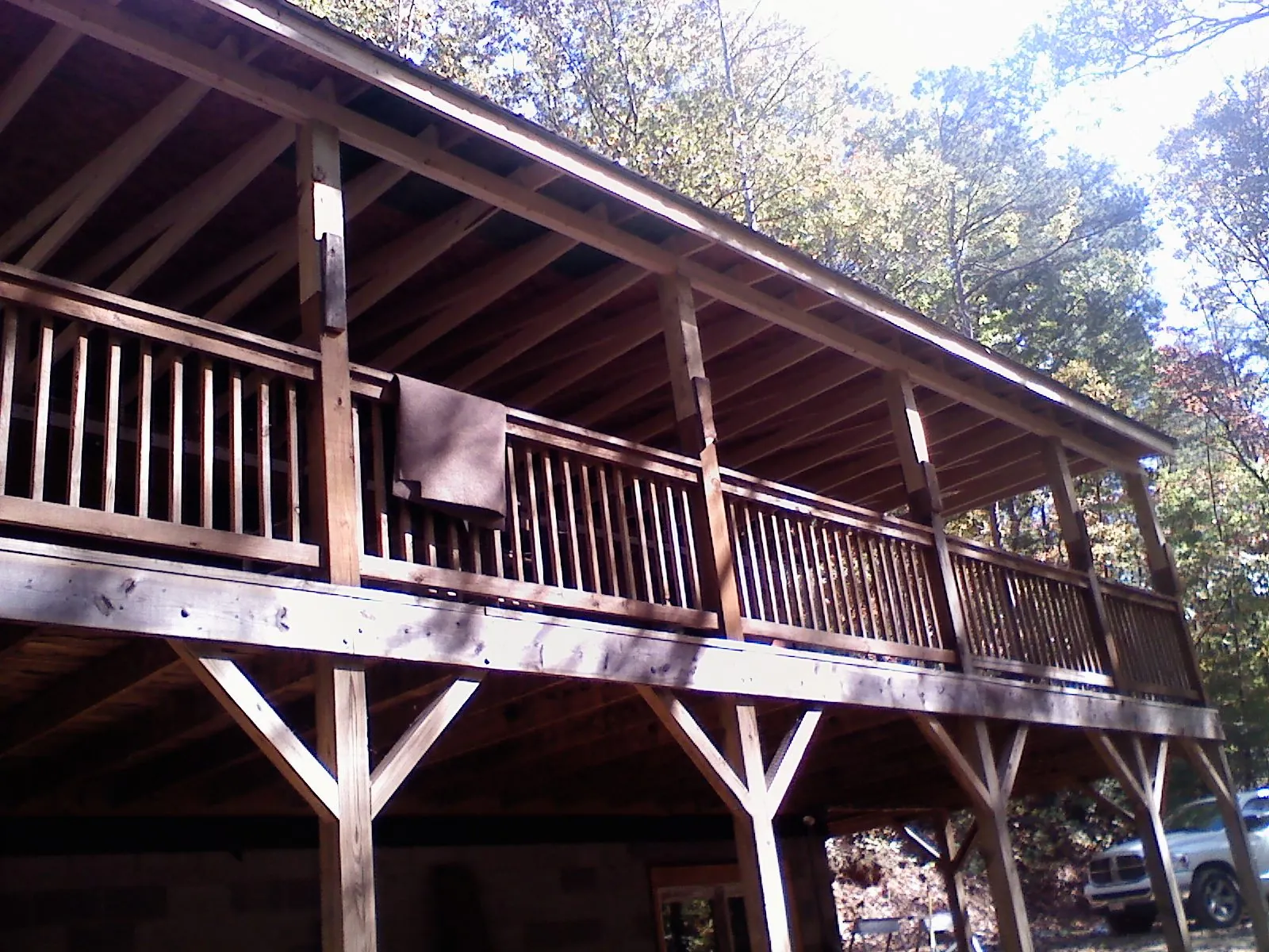 Timber framing under a new elevated porch and deck — Roof Leak Repair in Olga by Roofing Brothers